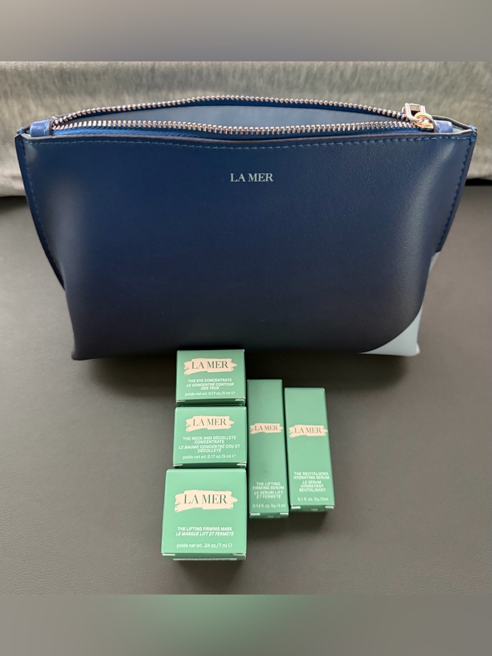 La Mer Navy and Light Blue Zippered Cosmetic Pouch with Mini Skincare Boxes
